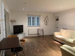 Et opholdsområde på The Croft Farmhouse Apartments