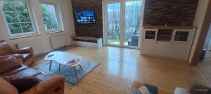 Et tv og/eller underholdning på Sluneční stráň - dům pro 9 osob