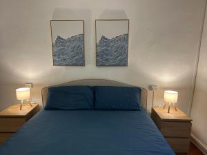 Postel nebo postele na pokoji v ubytování Il Borgo di Tresana Casa Marina