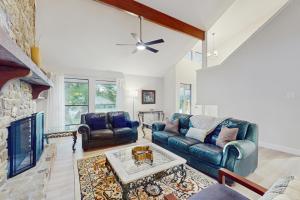 a living room with a couch and a fireplace at Horseshoe Bay Getaway in Horseshoe Bay