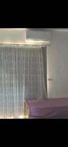 En eller flere senge i et værelse på Hurghada Alhelal