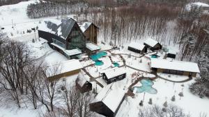 an aerial view of a resort in the snow at Holiday Inn Express Hotel & Suites Barrie by IHG in Barrie
