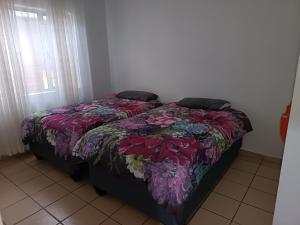 En eller flere senge i et værelse på Queens Gardens