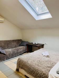 Ένα ή περισσότερα κρεβάτια σε δωμάτιο στο Studio Centru