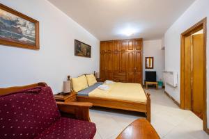 TV a/nebo společenská místnost v ubytování Tara Rooms In Heart Of Old Town Kotor