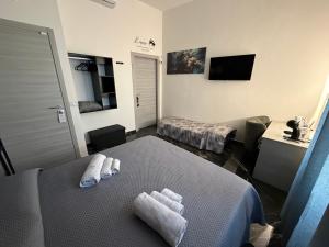 Кровать или кровати в номере Belvedere Lacinio Luxury Guest House