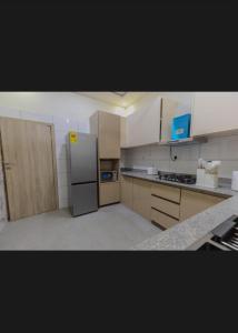 Η κουζίνα ή μικρή κουζίνα στο Sarahsiripi Apartment +40 φωτογραφίες