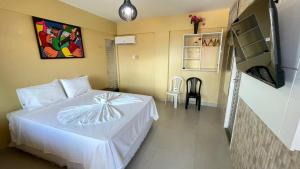 TV a/nebo společenská místnost v ubytování Hotel Concha do Mar