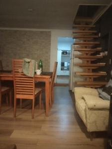 Posezení v ubytování Cabaña melinka y Cabaña Grande