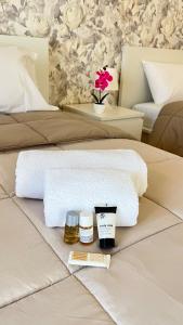 En eller flere senge i et værelse på torres locazione turistica