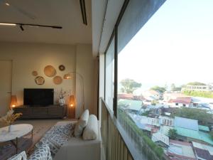 Posezení v ubytování Cozy Seaview Escape 2BR 6pax bythesea bathroom