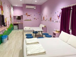 Postel nebo postele na pokoji v ubytování Xiao Liuqiu 539 民宿