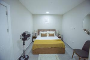 Postel nebo postele na pokoji v ubytování The Oasis Airport pick up WiFi Central + 36 fotografií