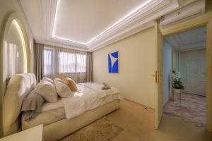 Giường trong phòng chung tại Princess Gueliz center, Comfort, Quiet and View