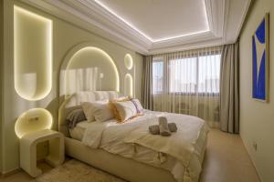 Giường trong phòng chung tại Princess Gueliz center, Comfort, Quiet and View