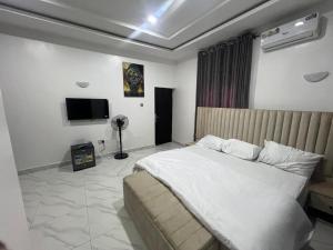 Postel nebo postele na pokoji v ubytování Dame Court