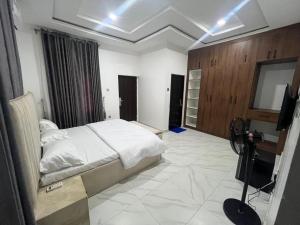 Postel nebo postele na pokoji v ubytování Dame Court