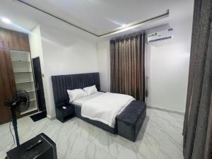 Postel nebo postele na pokoji v ubytování Dame Court