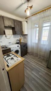 Kuchyň nebo kuchyňský kout v ubytování Квартира в Сисиане на главной площади Բնակարան Սիսիանում հրապարակի վրա Apartment in Sisian on the main square