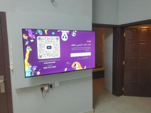 TV a/nebo společenská místnost v ubytování Al Buraq Economic Apartments