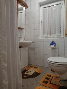 Ванная комната в Ferienwohnung Erlangen Urlaub mitten in Franken