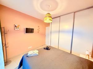 En eller flere senge i et værelse på Iconic T3 - Parking - Wifi - Vue mer et Montagne