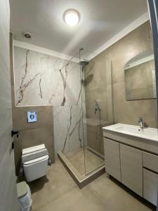 Ένα μπάνιο στο STO LOFO Apartments Kalyvia-Limenaria Thassos