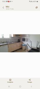 a view of a room with a table and chairs at Chambre in Schiltigheim +8 photos