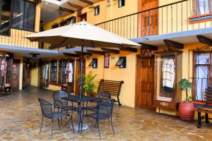 En restaurang eller annat matställe på Hotel Temático Mision Colonial