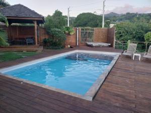 Πισίνα στο ή κοντά στο Manuia Lodge