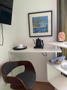 TV a/nebo společenská místnost v ubytování Villa Sonnenschein im Zentrum Bad Stebens nahe der Therme