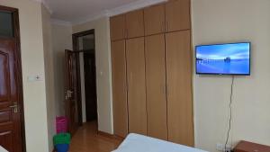 TV a/nebo společenská místnost v ubytování Chabaricourt Room B