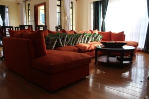 Posezení v ubytování Chabaricourt Room B