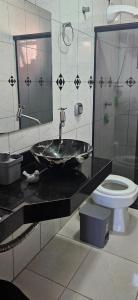 Et badeværelse på Piscina com Hidro Perto da Praia Poucas datas disponíveis