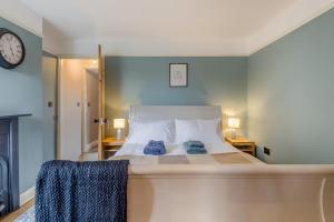 a bedroom with a bed with two towels on it at 2 Bed in Pakefield oc-p32922 in Lowestoft