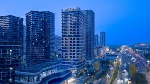 a view of a city with tall buildings at EVEN Hotel Chengdu Phoenix Mountain by IHG in Chengdu