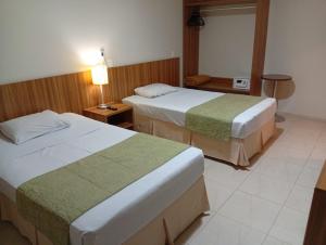 Postel nebo postele na pokoji v ubytování Boa Vista Eco Hotel