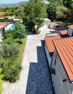 an aerial view of a house with a tile roof at CASA Kovac in Ljubuški +23 photos