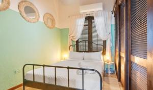 Ένα ή περισσότερα κρεβάτια σε δωμάτιο στο Chic 1-Bedroom & Loft in Prime Location