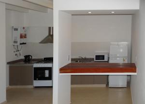 Кухня или мини-кухня в Departamentos Las Cañas
