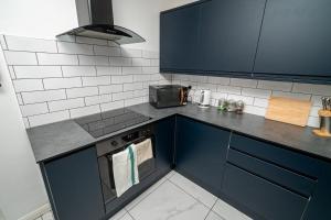 Køkken eller tekøkken på Norfolk City Centre 3BR Escape