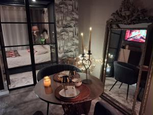 Телевизор и/или развлекательный центр в Bienvenue chez Glad et Guigui