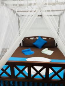 Кровать или кровати в номере Azure Mirissa