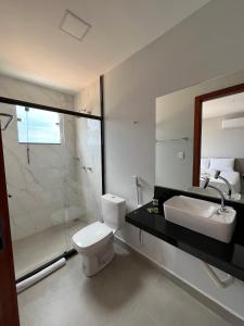 Koupelna v ubytování Piúma Palace Hotel