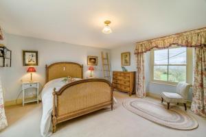 En eller flere senge i et værelse på 5 Bed in Bleadney oc-r33959 + 27 billeder