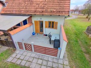 an overhead view of a small house with a porch at Villa Petz in Brežice +36 photos