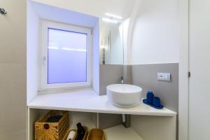 Et badeværelse på Villa Emma Exclusive + 25 billeder