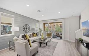 a living room with a couch and a table at Marbella Lane Chic Stay In Prime Irvine Area in Lake Forest +41 photos