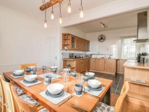 Kuchyň nebo kuchyňský kout v ubytování Maimies Harbourview