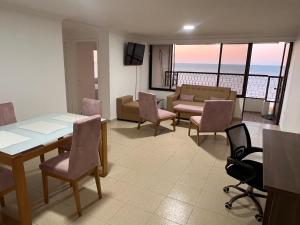 Et opholdsområde på R11 Riohacha lindo, cómodo y seguro apartamento con balcón mirando el mar